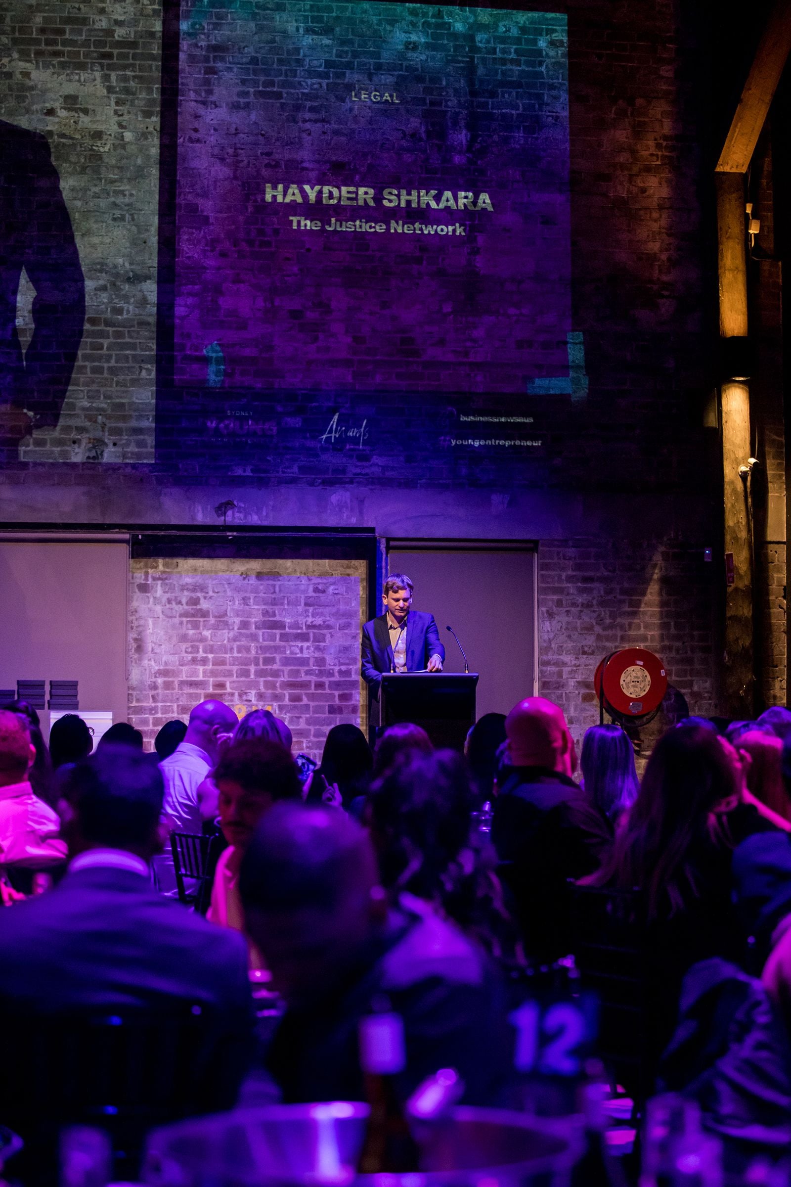 2025 Sydney Young Entrepreneur Awards Gala Dinner Winners accepting trophies on stage at the 2025 Sydney Young Entrepreneur Awards